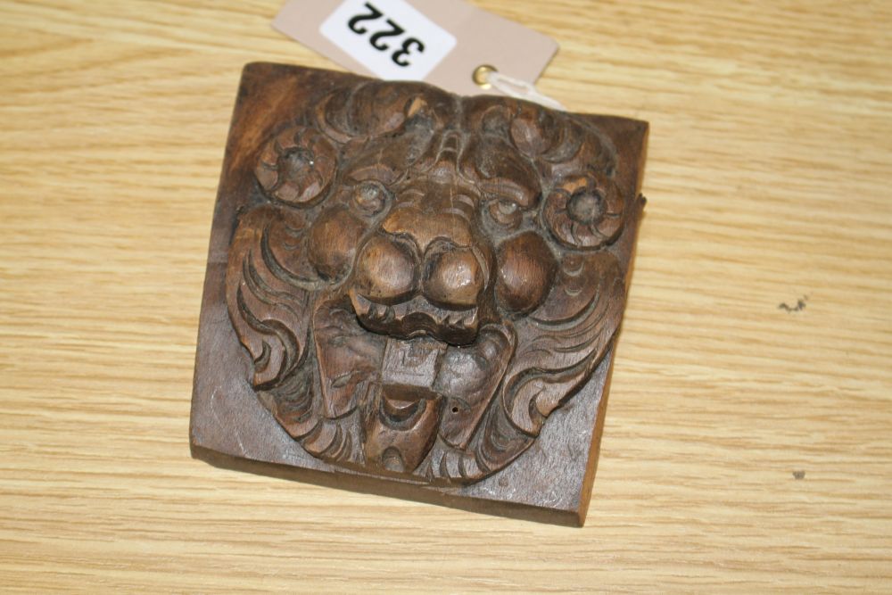 Three 19th century Continental carved oak corbels, carved with lion masks and a pair of scroll and dragon carved frieze panels